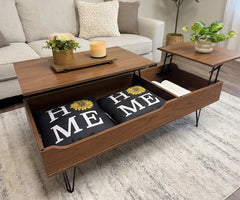 Wooden coffee table with lift-top design in a living room setting