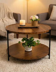 Wooden coffee table with a candle and plant in a living room setting